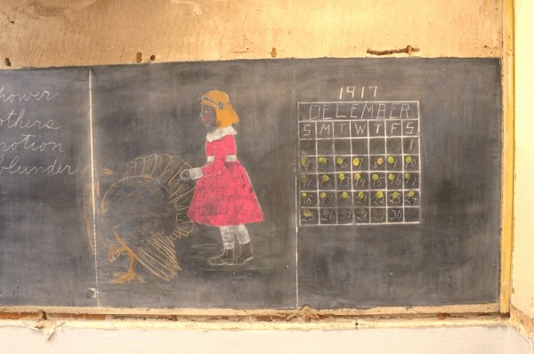 Construction Crew Finds Chalkboards From 1917 After Tearing Down Wall