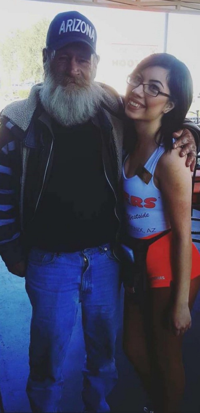 As Hooters Waitress Takes Photo, Homeless Man Reaches In His Pocket