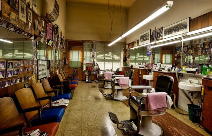 After sitting down to receive a standard trim from Abdulrahim Omar, a boy was shocked when he looked in the mirror and saw the final product.