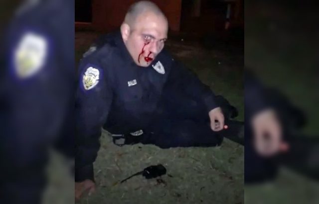 Bystanders ridicule cop as he s beaten by man he tries to arrest | us news