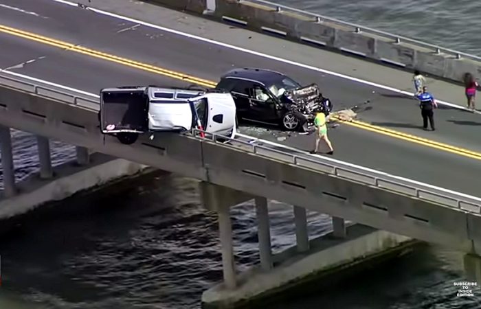 Multi-Vehicle Crash On Bridge; Man Peers Over Edge, Immediately Dives