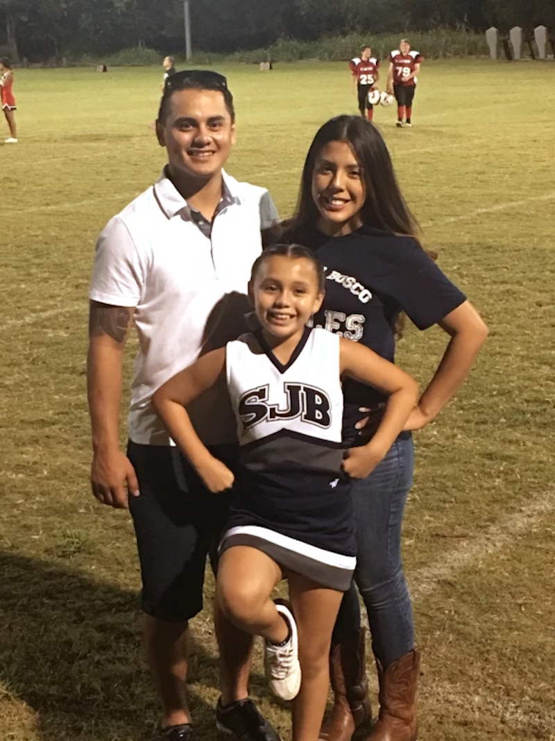 Stranger Hops Fence, Then He Runs Toward Lone Cheerleader